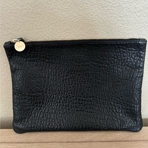 Clare V. embossed black leather clutch